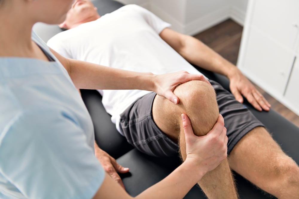 Patient,At,The,Physiotherapy,Doing,Physical,Exercises,With,His,Therapist 1760653408 37992a9d0b4d4535aa462ba0cc8f3a88 1 Operations We Perform in East Brunswick, NJ